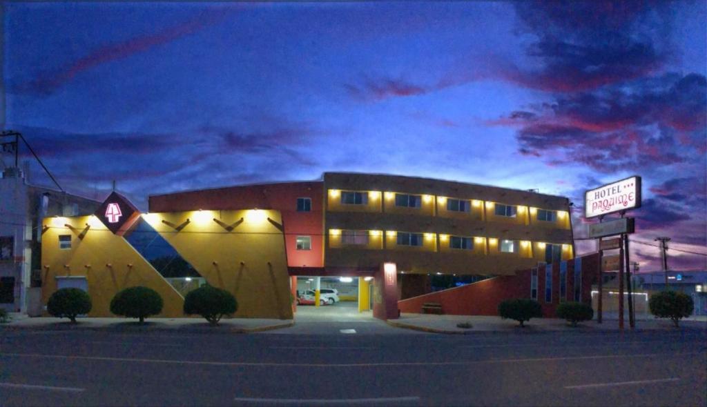Hotel Paquimé illuminated at dusk